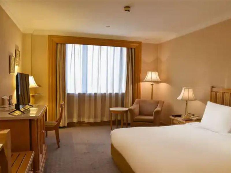 Crowne Plaza Shanghai Nanjing Road By Ihg ภายนอก รูปภาพ A room at the hotel