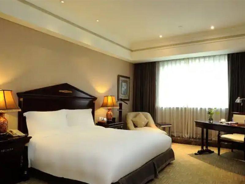 Crowne Plaza Shanghai Nanjing Road By Ihg ภายนอก รูปภาพ A room at the hotel